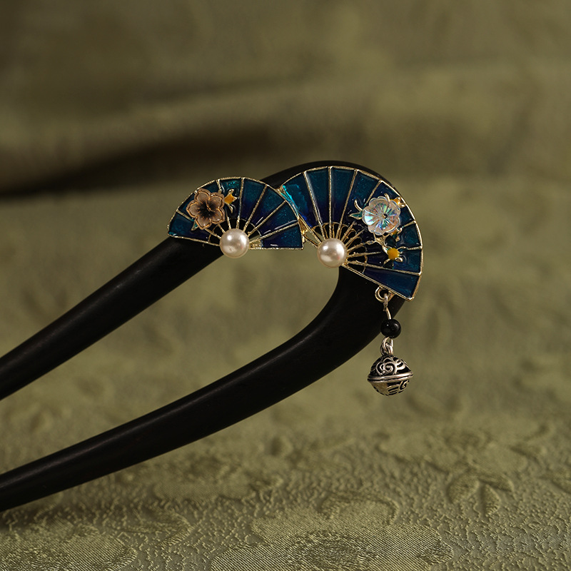 Blue fan hair fork